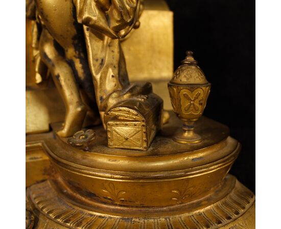 French clock in golden antimony