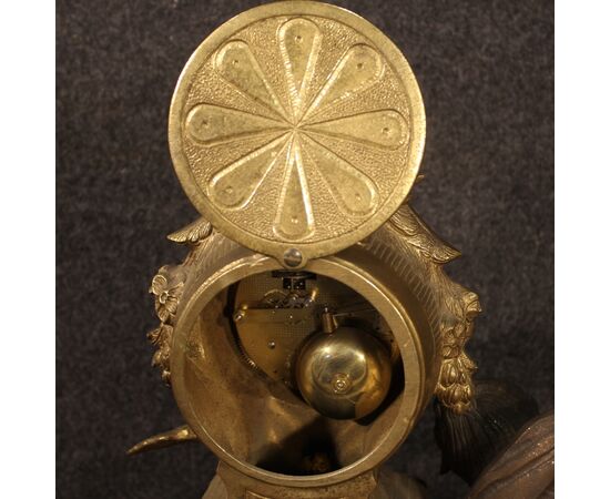 French clock in bronze and gilded antimony