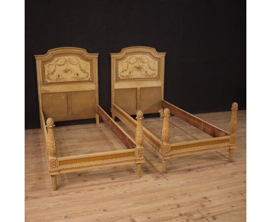 Pair of Louis XVI style beds in lacquered wood from the 20th century