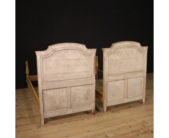 Pair of Louis XVI style beds in lacquered wood from the 20th century