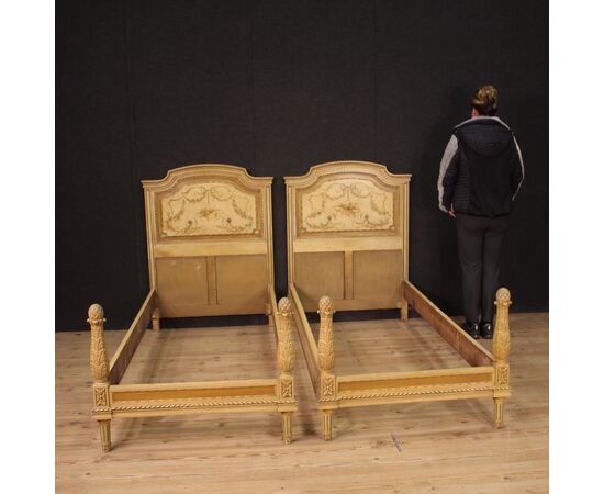 Pair of Louis XVI style beds in lacquered wood from the 20th century