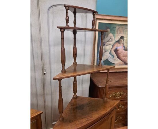 Pair of serpentine corner cabinets in blond walnut