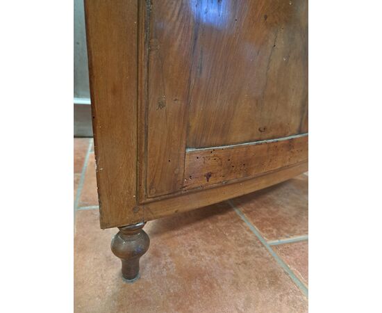 Pair of serpentine corner cabinets in blond walnut