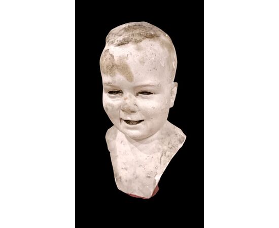 Testa di bambino in gesso