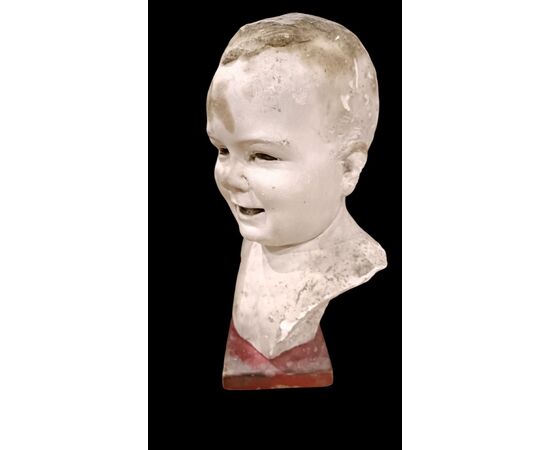 Testa di bambino in gesso