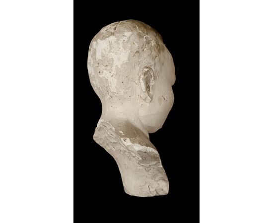 Testa di bambino in gesso