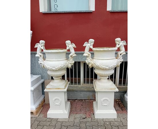 Pair of cast iron vases with Art Nouveau pedestal
