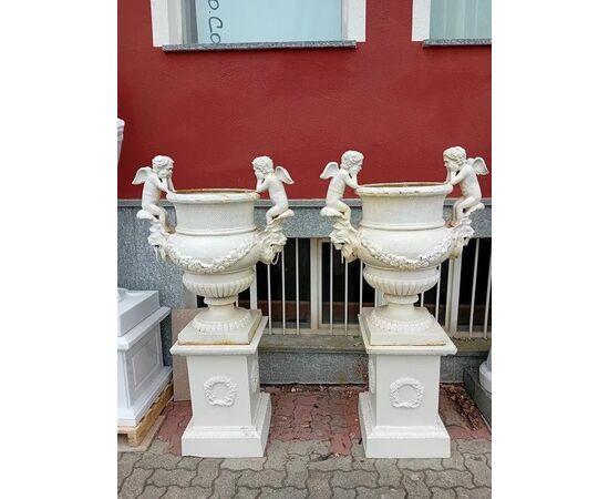 Pair of cast iron vases with Art Nouveau pedestal