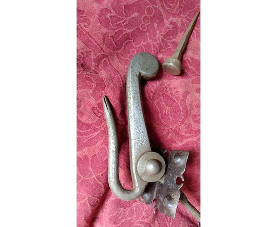 Elegantly worked iron snake-shaped knocker     