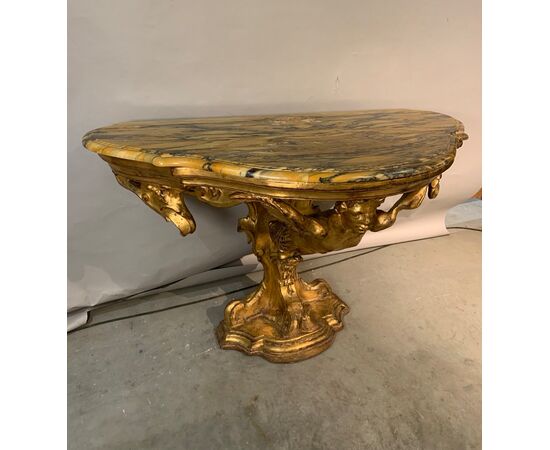 Carved and gilded wooden console table. Florence, 18th century.