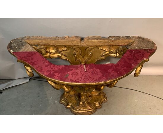 Carved and gilded wooden console table. Florence, 18th century.