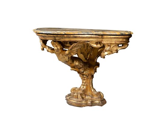 Carved and gilded wooden console table. Florence, 18th century.