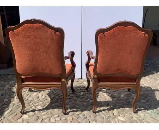 Pair of carved walnut armchairs. Genoa, 18th century.