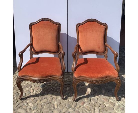 Pair of carved walnut armchairs. Genoa, 18th century.