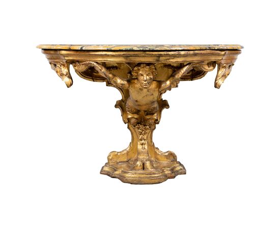 Carved and gilded wooden console table. Florence, 18th century.