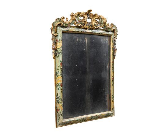 Carved and lacquered wooden mirror. Venice, 18th century.