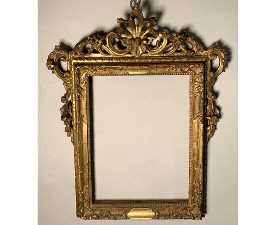 Carved and gilded wooden frame. Venice, 18th century.