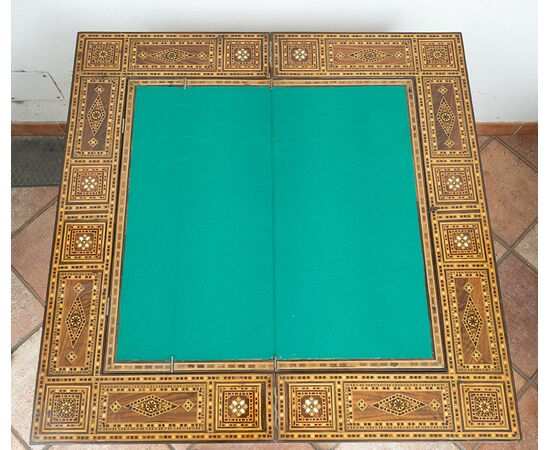 Antique game table in polychrome woods with mother-of-pearl inlays. Syria 19th century.