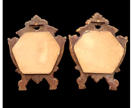 Pair of gilded wooden cartagloria frames.