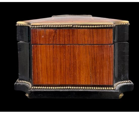 Inlaid wood box with geometric motifs.