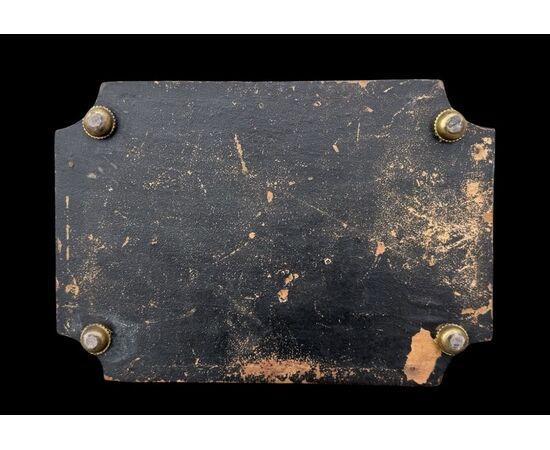 Inlaid wood box with geometric motifs.