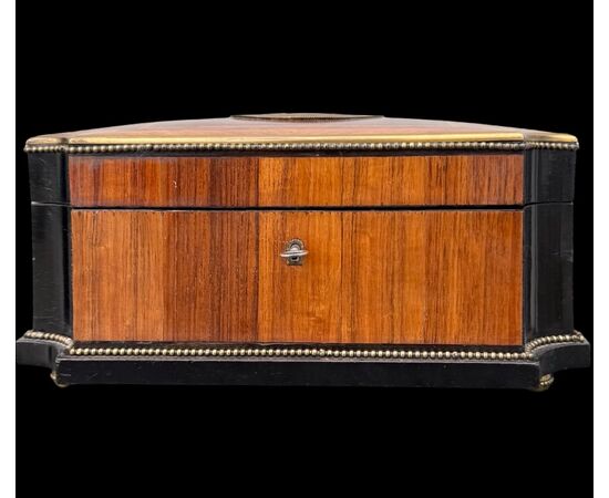 Inlaid wood box with geometric motifs.