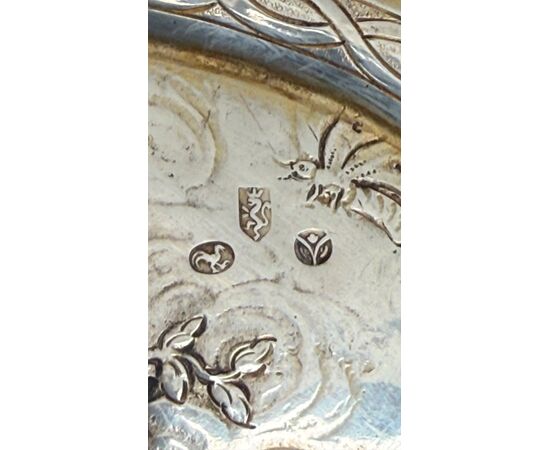 Pierced silver centerpiece with putti and figures. Holland.