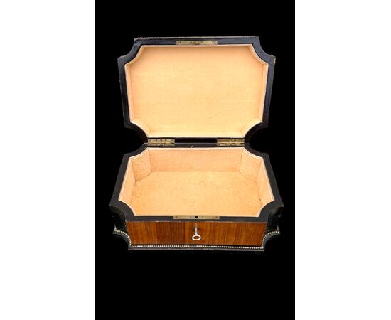 Inlaid wood box with geometric motifs.