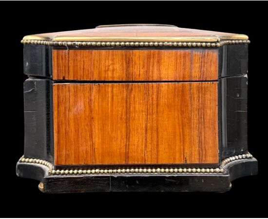 Inlaid wood box with geometric motifs.