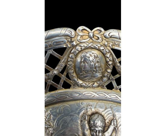 Pierced silver centerpiece with putti and figures. Holland.