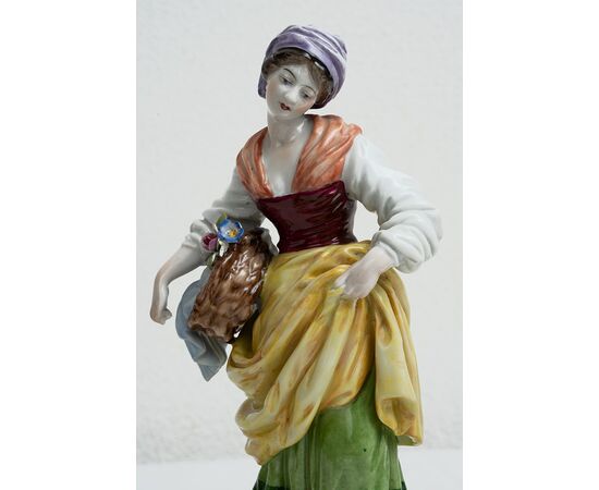 Group of four antique polychrome Capodimonte porcelain sculptures depicting the four seasons. Naples, 19th century.