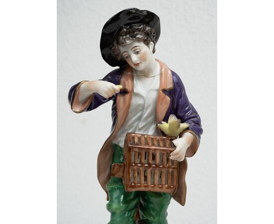 Group of four antique polychrome Capodimonte porcelain sculptures depicting the four seasons. Naples, 19th century.