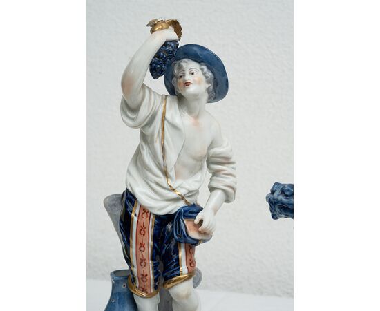 Group of four antique polychrome Capodimonte porcelain sculptures depicting the four seasons. Naples, 19th century.