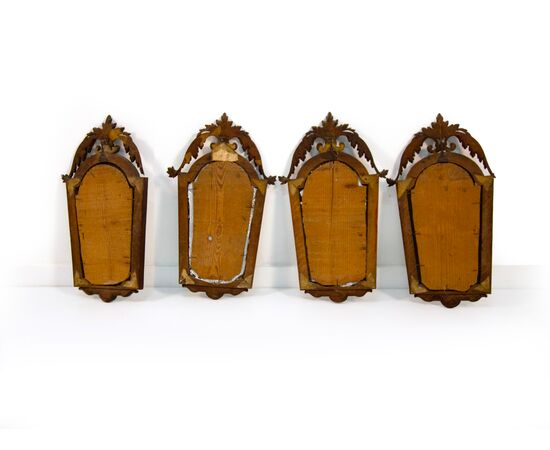 Four walnut and gilded wood wall sconces, early 19th century