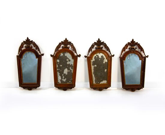 Four walnut and gilded wood wall sconces, early 19th century