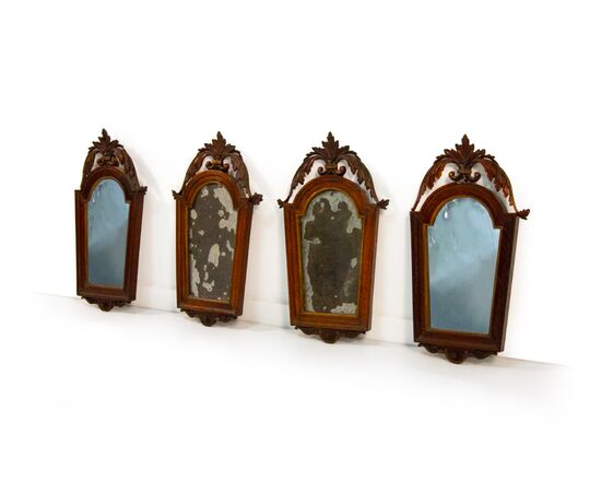Four walnut and gilded wood wall sconces, early 19th century