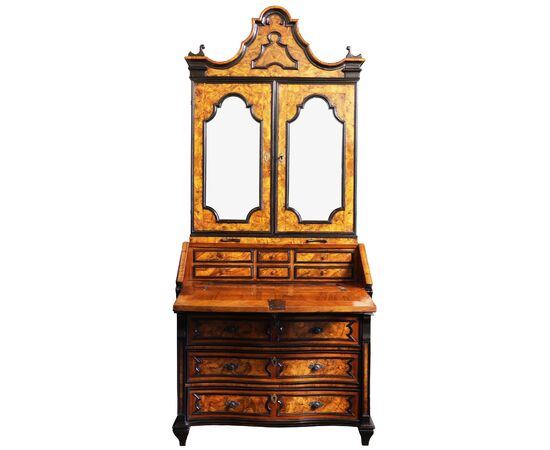 Walnut and burr walnut veneered trumeau with ebonized frames. Lombardy, 18th century