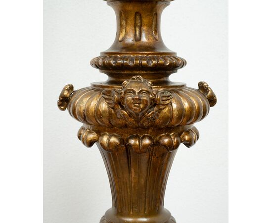 Pair of antique Florentine torcieri (torch holders) in gilded and carved wood, from the first half of the 19th century.