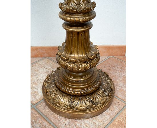 Pair of antique Florentine torcieri (torch holders) in gilded and carved wood, from the first half of the 19th century.