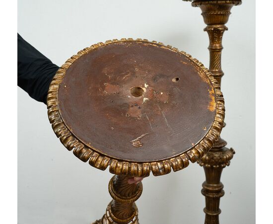 Pair of antique Florentine torcieri (torch holders) in gilded and carved wood, from the first half of the 19th century.
