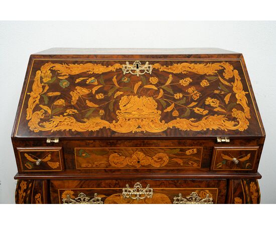 Antique Dutch drop-front desk in fine woods from the early 19th century.