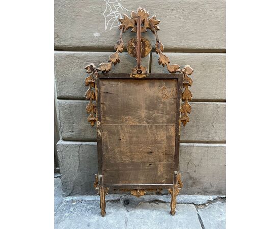 Specchiera in legno intagliato e argentato