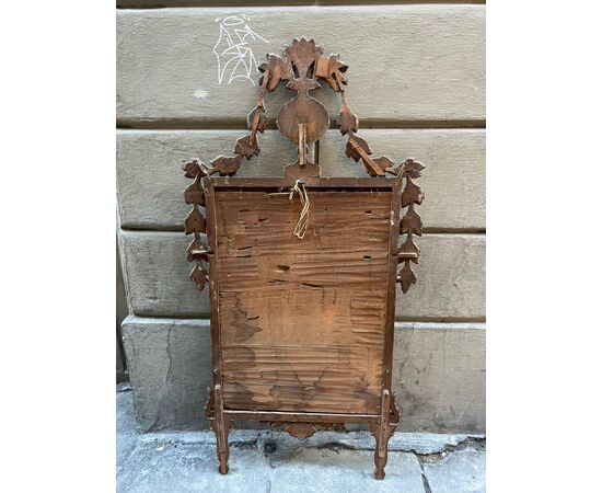 Specchiera in legno intagliato e dorato