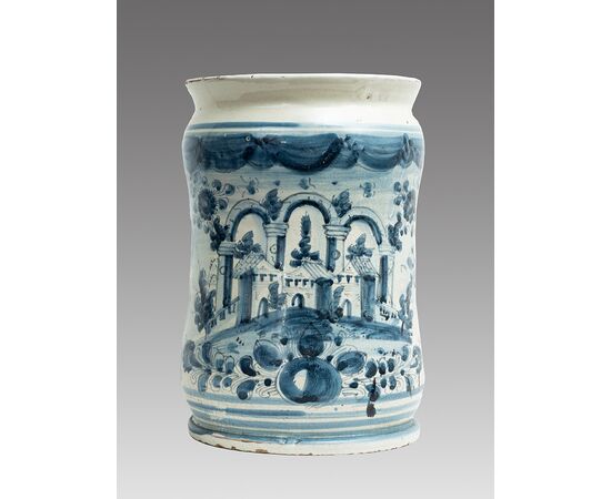 Antique Albarello/Vase in glazed majolica depicting a landscape with ruins. Naples, 18th century.