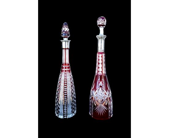 Serie di 11 bottiglie in cristallo molato.Boemia.