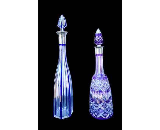 Serie di 11 bottiglie in cristallo molato.Boemia.