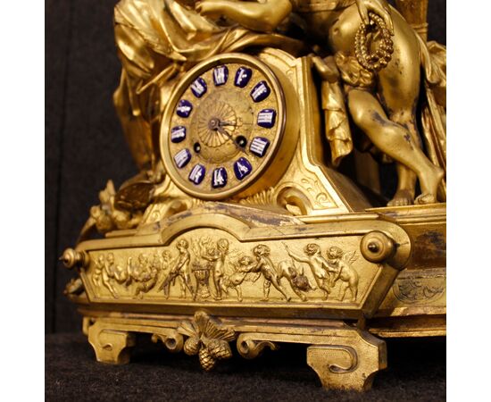 French clock in golden antimony 