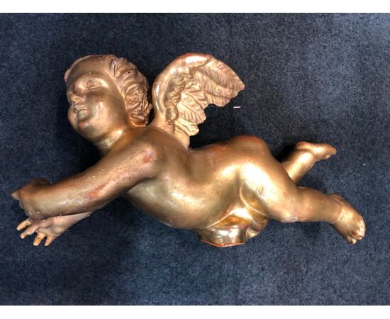 Pair of carved wooden angels and gold leaf. Liguria.     