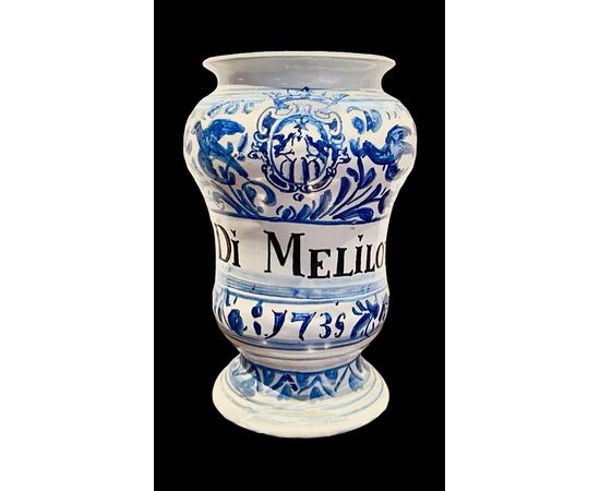 Maiolica albarello vase with plant motifs, birds, and snakes decoration. Ferniani, Faenza.