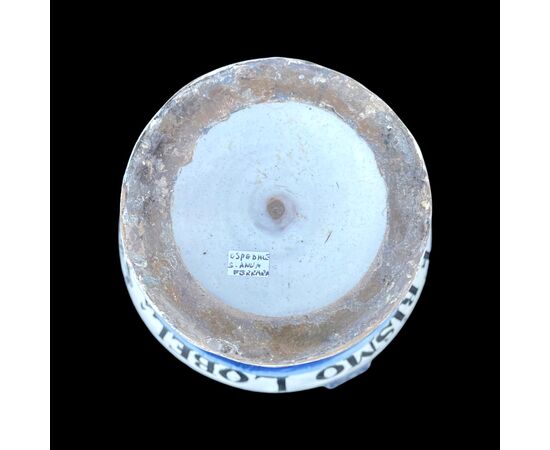 Majolica pouring vessel with turquoise decoration, calligraphic motifs, animal and plant subjects, and the date 1735. Ferniani manufacture, Faenza.